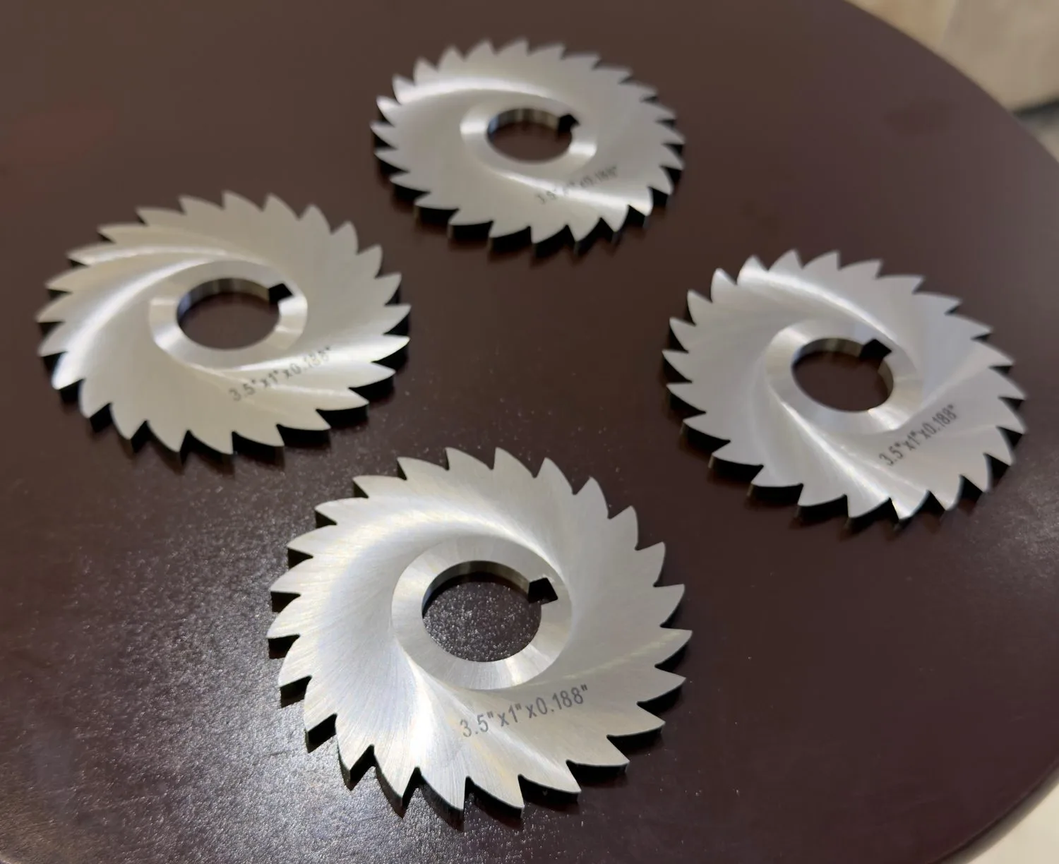 Range of HSS metal slitting saws in different diameters and tooth counts from Maxwell Slitter Industries.